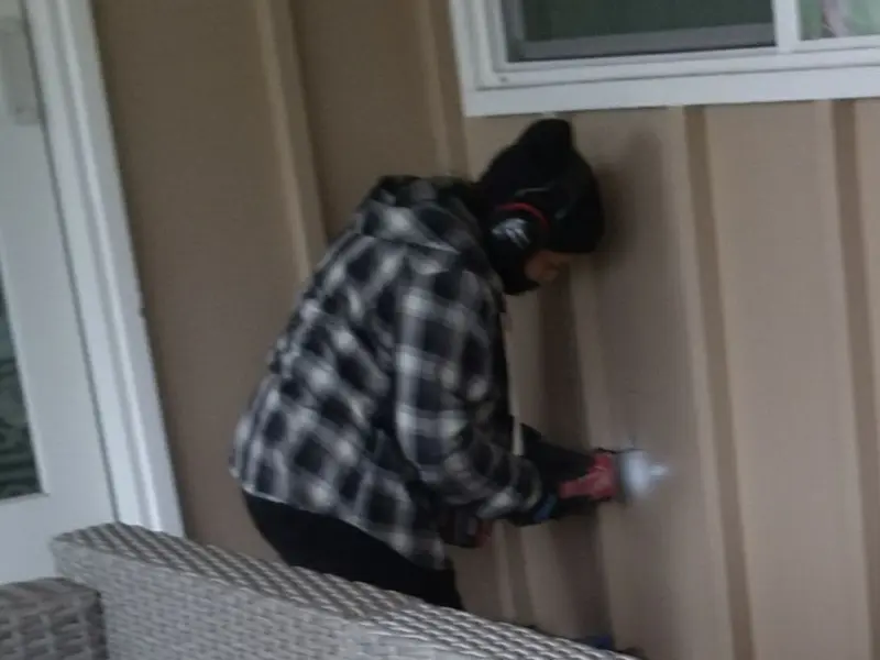Professional electrician installing an exterior outlet in Pendleton